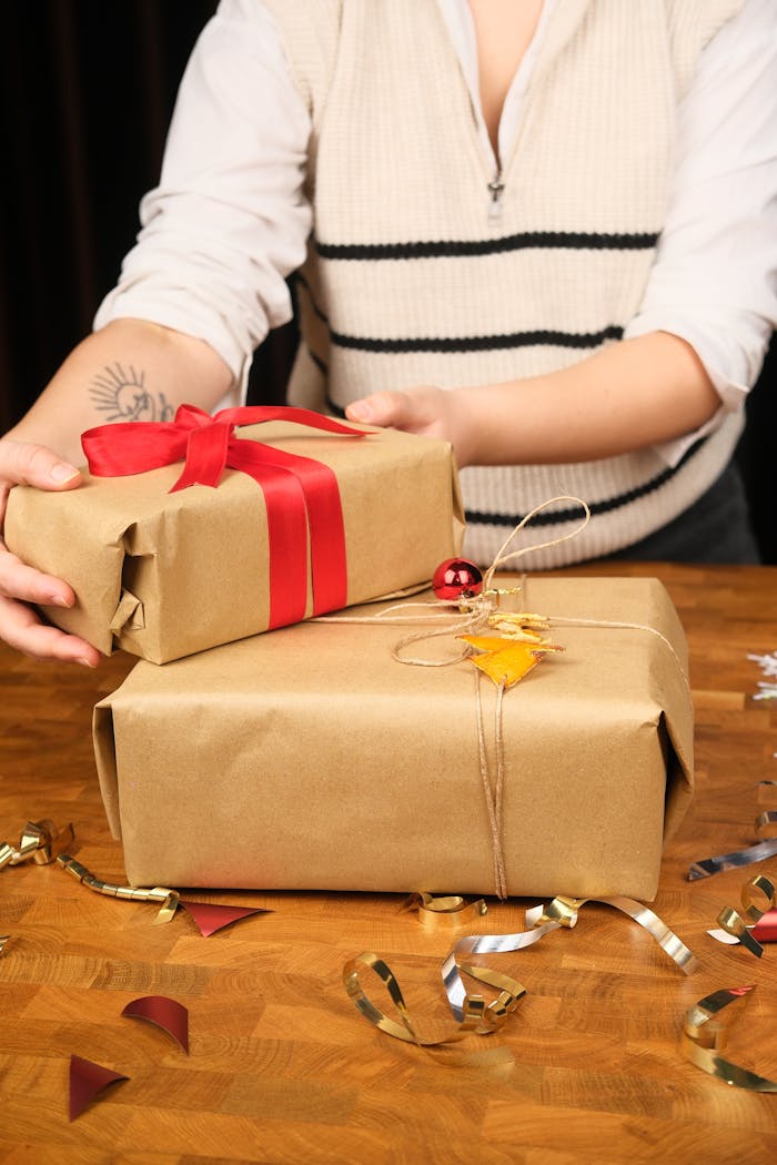services-03 Giving gifts wrapped in eco-friendly brown paper with a festive touch for the holiday season.